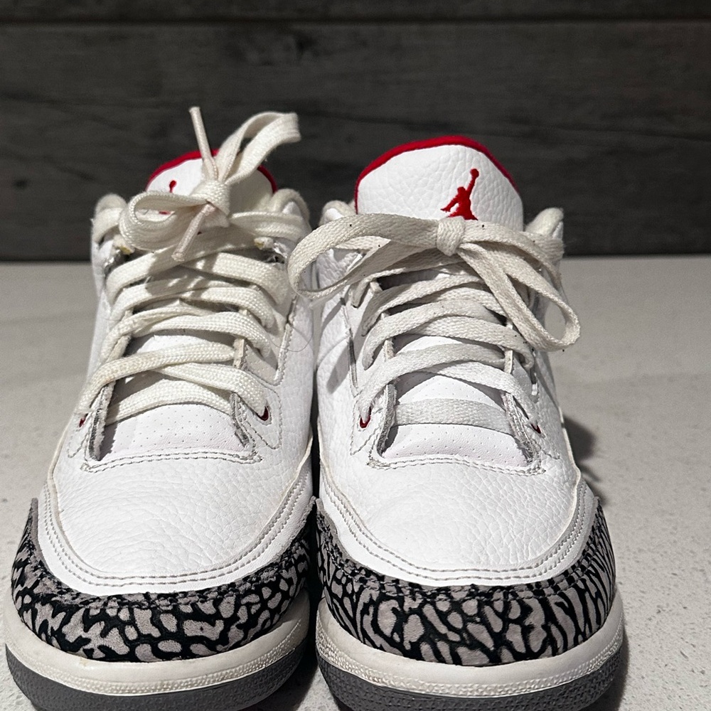 Kids Jordan White and Black Sneakers